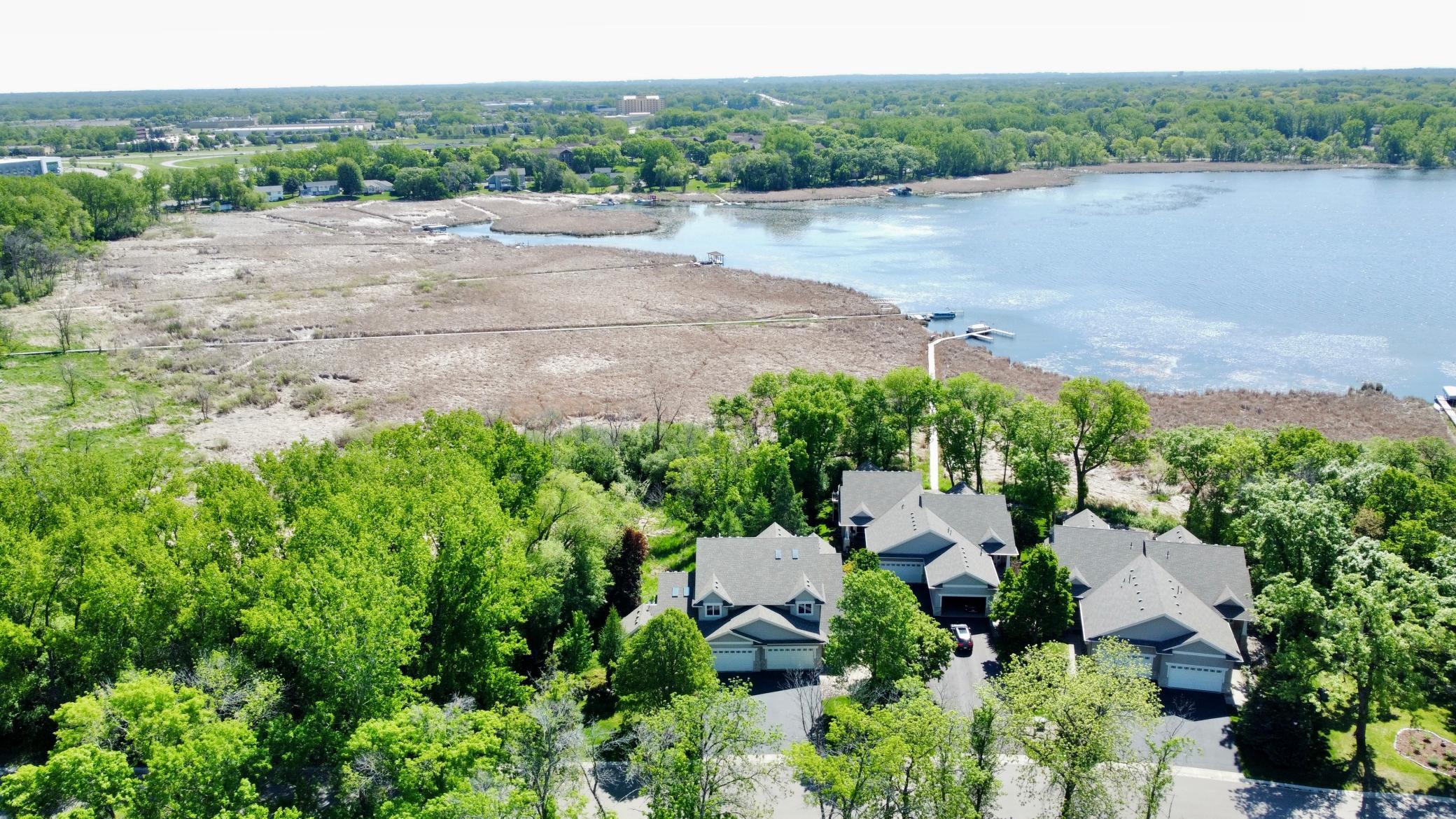 Peaceful lakeside living with unmatched privacy, your Eagle Lake retreat surrounded by water, wetlands, and nature