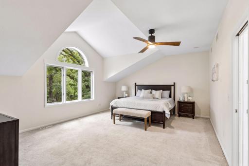 Primary suite with private bath and walk-in closet