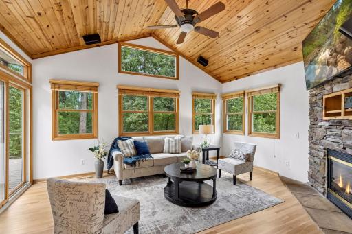 Sunroom overlooking the wooded property