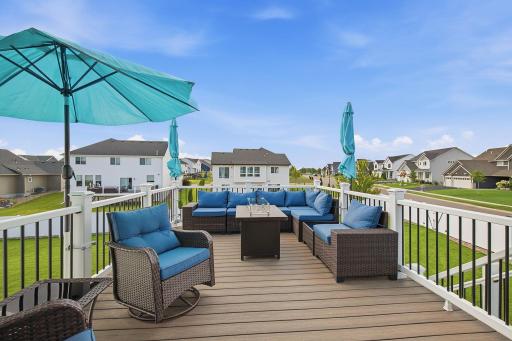Enjoy a beautiful no-maintenance dry deck designed for easy outdoor living. A gutter system underneath helps keep the patio below dry, adding functionality to both outdoor levels.