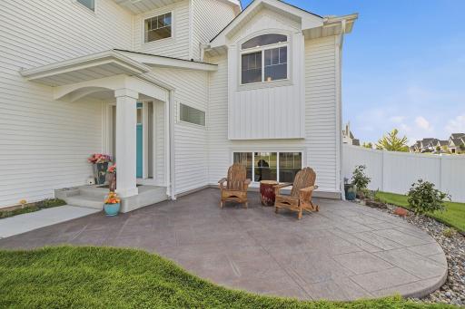 Beautiful curb appeal welcomes you home, with a spacious driveway, oversized three-car garage, and attractive exterior. The custom stamped-concrete front patio adds another finished outdoor space to enjoy.