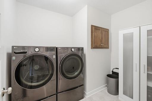 Main-level laundry keeps daily routines convenient and functional. The home's thoughtful layout puts frequently used spaces exactly where you need them.