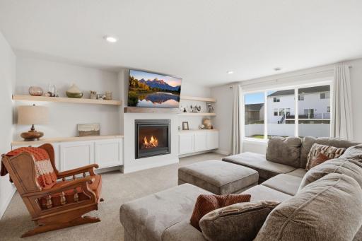 There is plenty of room here for movie nights, entertaining, a game area, or everyday relaxing. The walkout design keeps the lower level bright and connected to the outdoors.