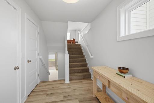 A welcoming front entrance leads into this thoughtfully designed modified Jasmine floor plan. Built in 2022, the home combines newer construction with upgrades and improvements already completed for you..