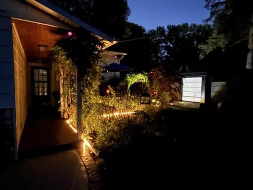 Evening photo. Front deck and meditation waterfall.