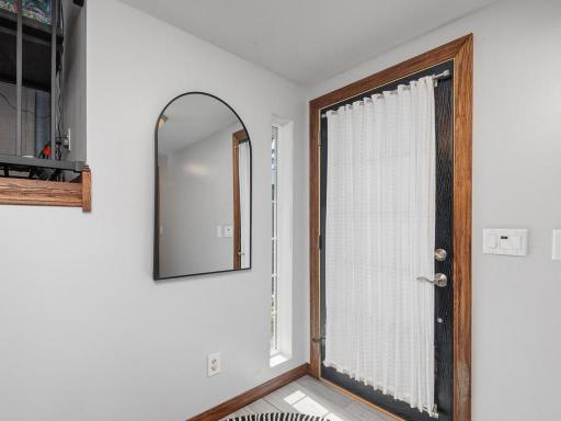 Front foyer entry with sidelight window.