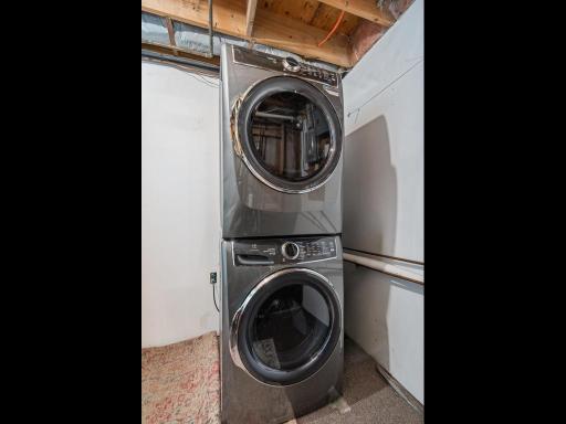 Lower level laundry complete with newer front load washer and dryer.