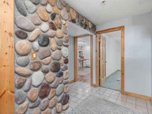 Lower level area. 2 additional bedroom entry doors as pictured.
