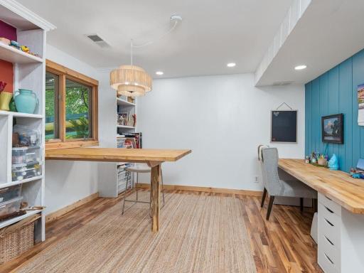 Spacious 4th bedroom currently used as a fun craft area and office.