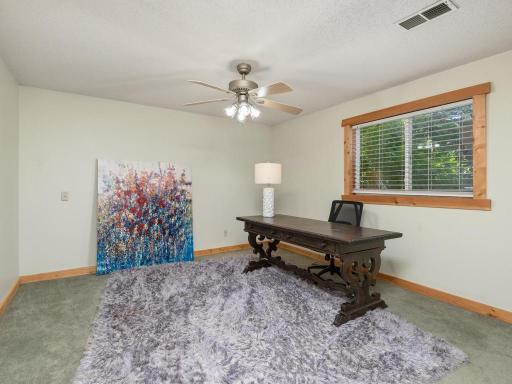 Spacious 3rd bedroom downstairs used as an office at this time.