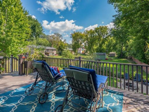 Morning coffee, or outdoor dining. Deck just off the kitchen area. Wonderful views of the fenced backyard.