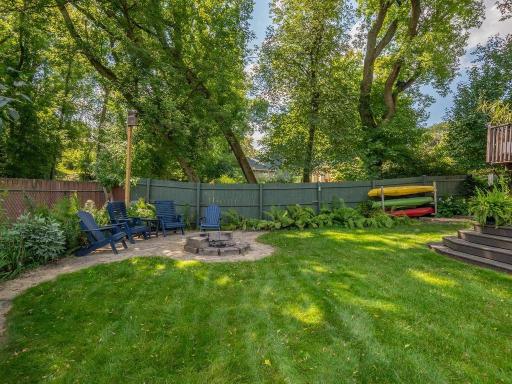 Backyard with beautiful plantings for year round vibrancy. provide year round vibracy .