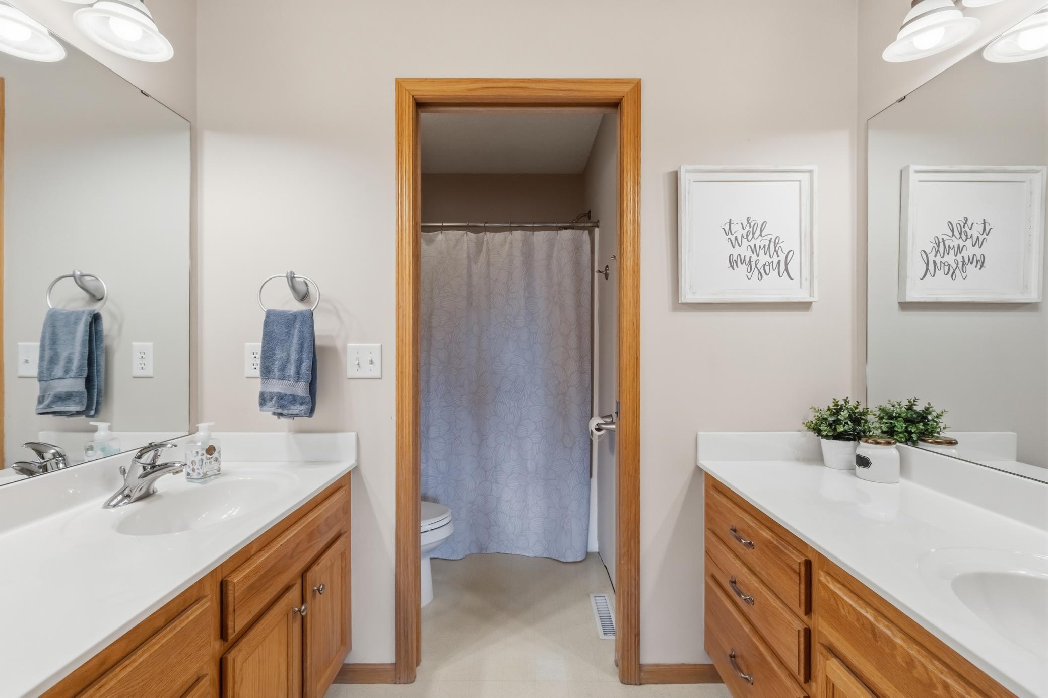 Full Bath on upper floor with his/her sinks and seperate shower area