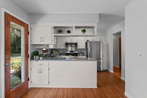 A different perspective of the kitchen from the dining area.