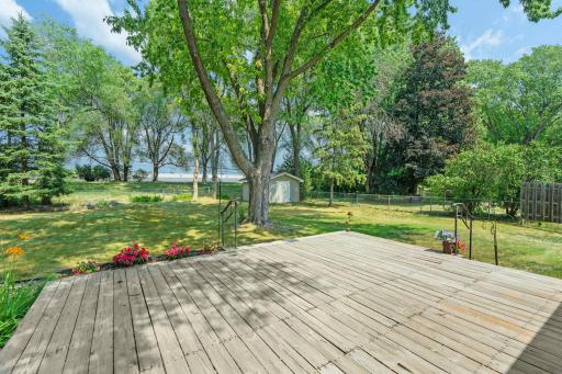 A view from the deck overlooking the peaceful, fully fenced backyard.