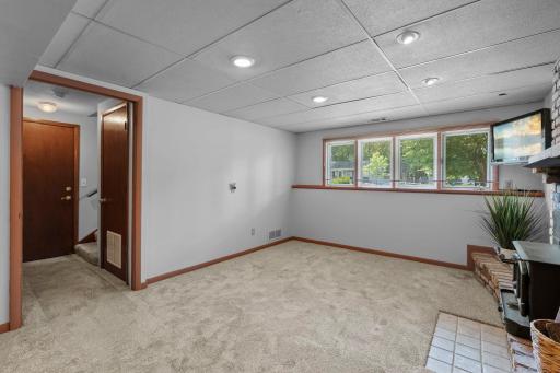 The family room offers lookout windows for natural light.