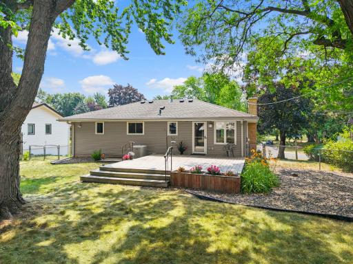 The backyard also offers an spacious deck, and a storage shed.