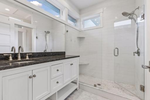 Another surprise is the gorgeous primary bathroom.