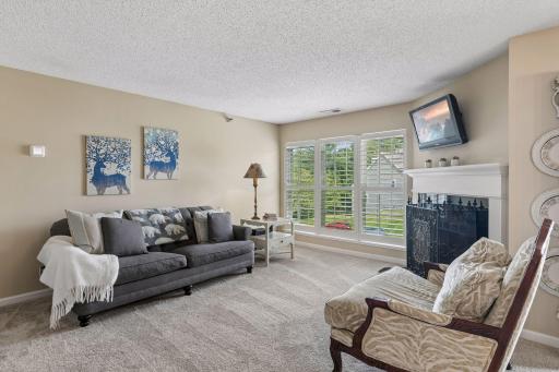 Spacious living room with wood burning fireplace!