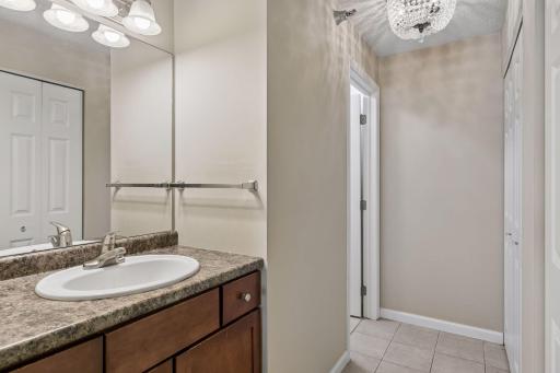 Sink to the ensuite is conveniently located across from the closet for ideal dressing room set up.