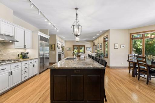 The well-equipped kitchen pairs generous workspace with abundant cabinetry and storage.
