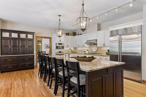 An oversized island creates a natural gathering place for meals and entertaining.