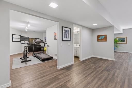 The remodeled walkout lower level includes dedicated space for an at-home gym.