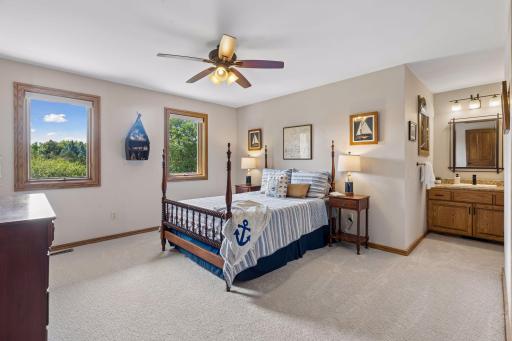 Generously sized upper-level bedroom offers flexibility for family, guests or hobbies.