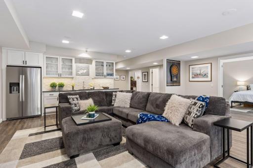 The remodeled lower level features a wet bar perfect for entertaining and guests.
