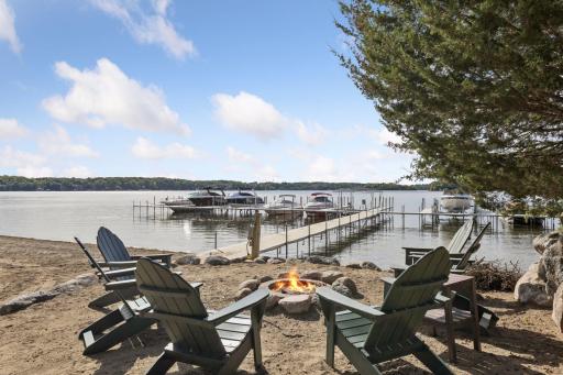 Boulder Bridge Community beach and boat slip area. A deeded boat slip makes enjoying the Lake Minnetonka lifestyle effortless.