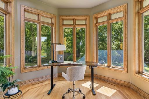 Main level office/sitting area area with plenty of natural light.