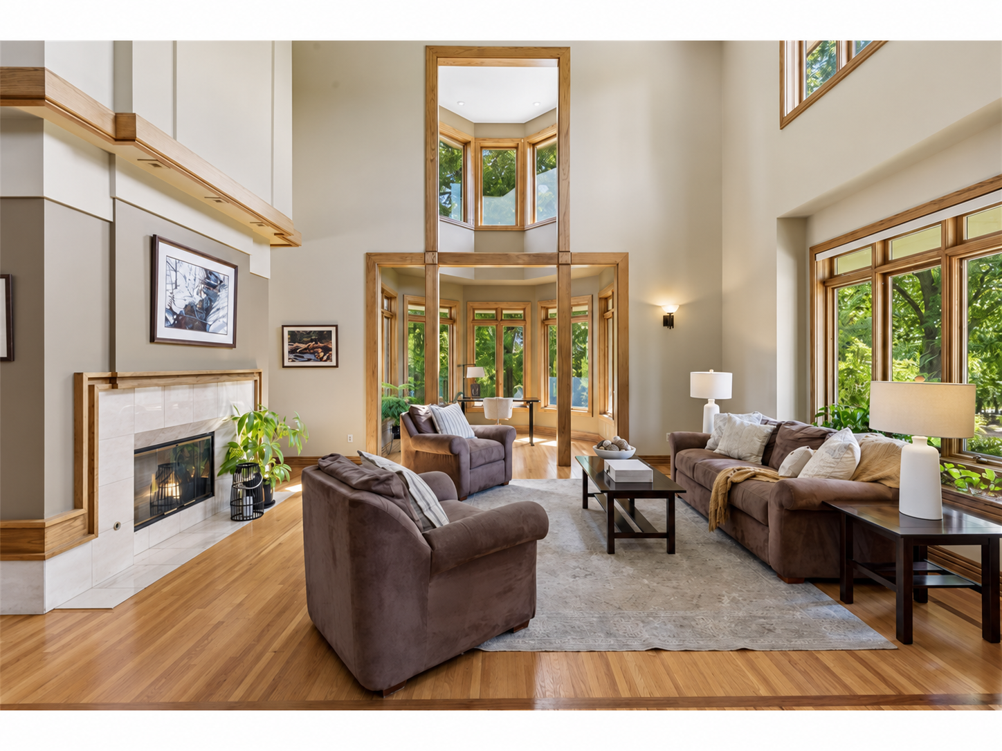 Soaring ceiling height and plenty of natural light in the main floor living room and office/sitting area