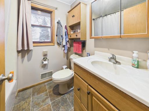 Main floor full bath next to the master bedroom