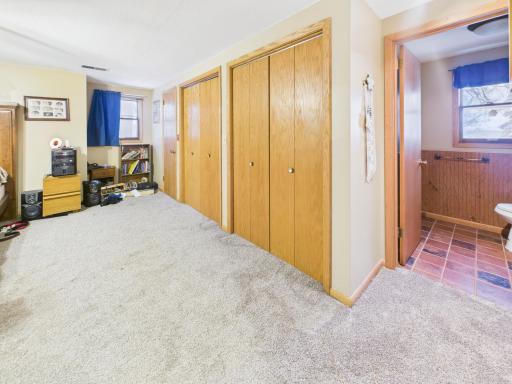 One of the bedrooms upstairs has its own private 1/2 bath and 3 closets.
