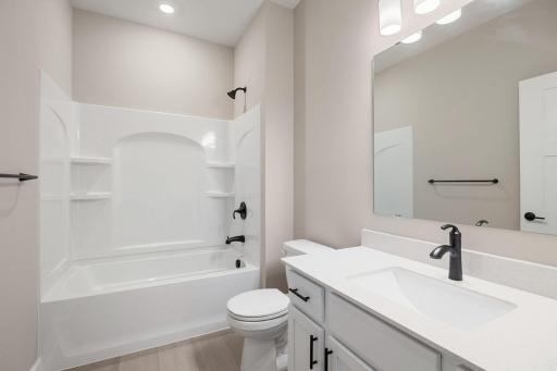 The optional finished basement includes a full-size bathroom with a shower-tub combo