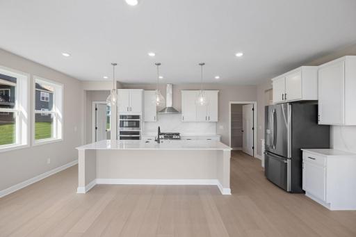 Aspiring home chefs can create culinary memories with modern appliances and ample prep space in a well-equipped and open kitchen.