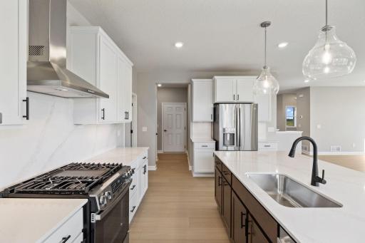 Seamlessly flow from cooking to conversation in this open-concept heart of the home