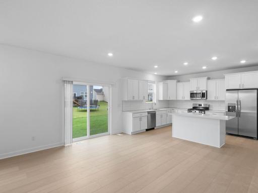 Steps from the kitchen, the dining room helps residents effortlessly prepare and serve home-cooked meals straight from the stove to the dining table.