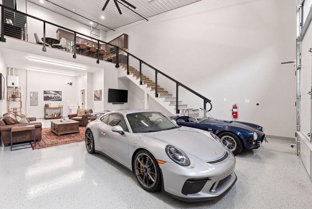 Virtually Staged - Collector space meets private lounge, giving you a place to enjoy the cars instead of simply storing them.