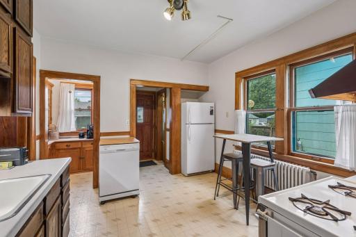 Kitchen includes large pantry and easy access to backyard