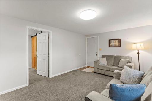 Modern design, newer flooring, white 6 panel doors and trim.