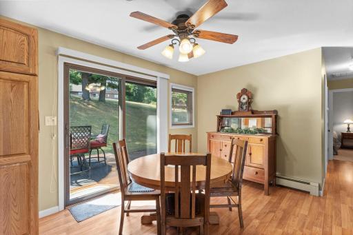 Informal dining walks out to private backyard deck.