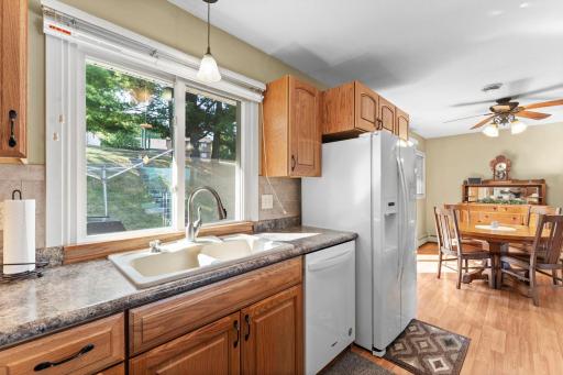 Kitchen window brings an abundance of light into this space.