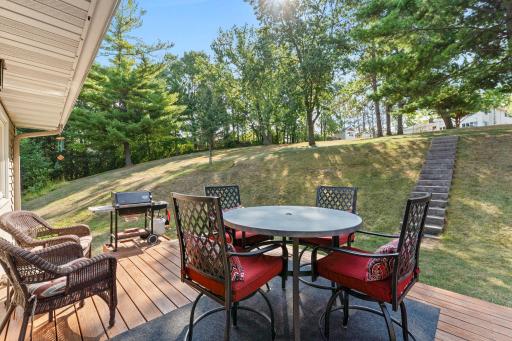 Walkout from main level to fabulous private backyard.