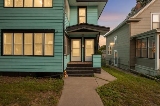 This duplex offers separate front entry for each unit.