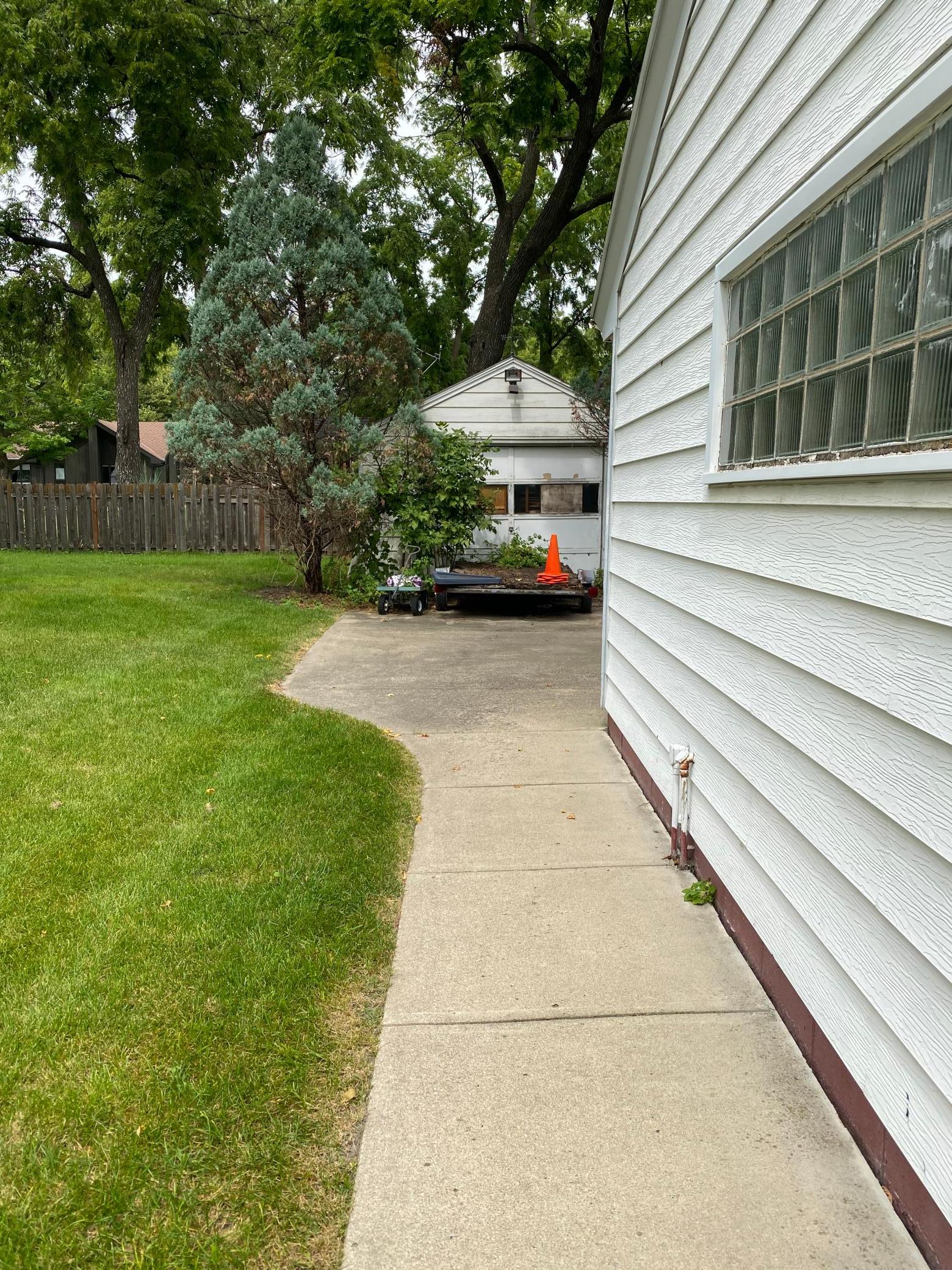 Sidewalk to backyard