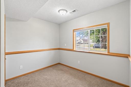Virtually emptied 3rd bedroom in lower level.