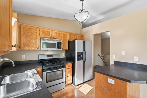Fully stocked kitchen with stainless steel appliances and a gas range!