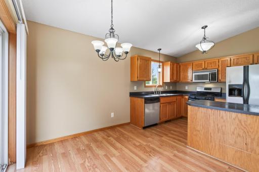 Dining is merely steps away from the kitchen.