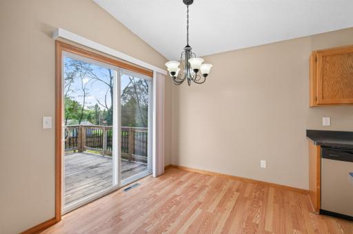 Dining space leads to HUGE deck overlooking the backyard!
